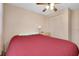 Bedroom with a ceiling fan and a closet at 304 Roma Rd, Venice, FL 34285