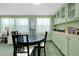 Warm and inviting dining room with a built-in buffet cabinet at 304 Roma Rd, Venice, FL 34285