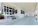 Attractive property showing the covered carport and screened entrance with access to a storage area at 304 Roma Rd, Venice, FL 34285