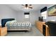 Comfortable main bedroom with wood accents, a ceiling fan, carpeting, and closet at 304 Roma Rd, Venice, FL 34285