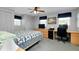 A well-lit bedroom with wood accents, carpeting, and multiple storage closets at 304 Roma Rd, Venice, FL 34285
