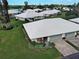 Beautiful home with two-car garage, well-kept lawn, and inviting curb appeal in a serene community at 3141 Heron Shores Dr, Venice, FL 34293