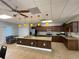 Beautiful kitchen with granite countertops, stainless steel appliances, and a large island at 3141 Heron Shores Dr, Venice, FL 34293