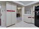 Spacious kitchen area offers ample storage and transitions seamlessly into the dining space at 3141 Heron Shores Dr, Venice, FL 34293