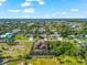 Aerial view of home near the water and community at 329 Myrtle Ave, Nokomis, FL 34275