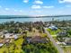 Aerial view of home near the water and community at 329 Myrtle Ave, Nokomis, FL 34275