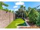 This home has its own backyard batting cage, perfect for practicing your swing in your free time at 329 Myrtle Ave, Nokomis, FL 34275