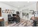 Functional home office featuring wood floors, custom built-ins, and ample workspace at 329 Myrtle Ave, Nokomis, FL 34275