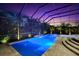 The luxurious pool and spa features pavers and lush landscaping, perfect for relaxation and entertainment at 329 Myrtle Ave, Nokomis, FL 34275