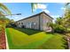 A spacious putting green in the backyard of this home at 329 Myrtle Ave, Nokomis, FL 34275