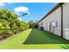 A spacious putting green in the backyard of this home at 329 Myrtle Ave, Nokomis, FL 34275
