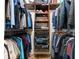 Spacious walk-in closet featuring wood shelving, hanging rods and wire storage baskets at 329 Myrtle Ave, Nokomis, FL 34275