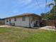 Backyard view showcasing a patio with grill and privacy at 3311 Papaya Rd, Venice, FL 34293