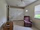 Bonus Room with tile floors, a ceiling fan, closets and a window at 3311 Papaya Rd, Venice, FL 34293