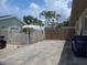 Driveway leading to a wooden fence at 3311 Papaya Rd, Venice, FL 34293