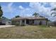 Beautiful single-story home with a landscaped front yard at 3311 Papaya Rd, Venice, FL 34293