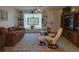 Comfortable living area showcases built-in shelving, cozy seating, and a stylish entertainment center at 3311 Papaya Rd, Venice, FL 34293
