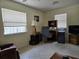 View of the spacious office with a large window at 3311 Papaya Rd, Venice, FL 34293