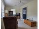 Bright sun room featuring tile floors, a ceiling fan, and sliding glass doors at 3311 Papaya Rd, Venice, FL 34293