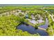 An aerial view showcases this property's waterfront location at 3382 Mermoor Dr # 3201, Palm Harbor, FL 34685