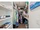 Organized walk-in closet with ample shelving and hanging space for storage needs at 3382 Mermoor Dr # 3102, Palm Harbor, FL 34685