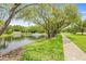 Enjoy community walking paths along this pond at 3382 Mermoor Dr # 3201, Palm Harbor, FL 34685