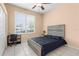 Bedroom with a large window and a desk at 3950 Pepper Ln, North Port, FL 34287