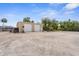 Exterior view of a spacious garage with two doors and ample parking space, perfect for storage or workshop at 3950 Pepper Ln, North Port, FL 34287
