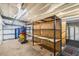 Inside a large garage showcasing metal shelving units, offering ample space for storage and organization at 3950 Pepper Ln, North Port, FL 34287