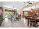 Bright open floor plan seamlessly connects the living, dining, and kitchen areas, perfect for modern living at 3950 Pepper Ln, North Port, FL 34287