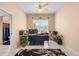 Cozy home office with ceiling fan and plenty of natural light at 3950 Pepper Ln, North Port, FL 34287
