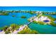 Beautiful aerial view of waterfront homes and bridge over a calm body of water at 3950 Pepper Ln, North Port, FL 34287