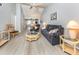 Cozy living room featuring high ceilings, neutral tones, and contemporary furnishings at 421 Cerromar Ter # 471, Venice, FL 34293