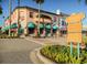 Vibrant town center with quaint shops, colorful awnings, and inviting streetscape, perfect for a leisurely stroll at 421 Cerromar Ter # 471, Venice, FL 34293