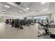 Well-equipped gym featuring modern exercise machines and ample natural light at 427 Autumn Chase Dr, Venice, FL 34292