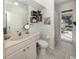 Bathroom with vanity, a large mirror and shower at 463 Park Trace Blvd, Osprey, FL 34229