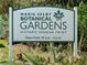 Marie Selby Botanical Gardens sign welcomes visitors to the lush Historic Spanish Point location and gardens at 463 Park Trace Blvd, Osprey, FL 34229