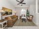 Inviting living room with comfortable seating and warm, natural lighting at 463 Park Trace Blvd, Osprey, FL 34229
