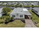 Beautiful home features great curb appeal, brick-paved driveway, and carport at 485 Schooner St, North Port, FL 34287