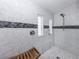A newly renovated bathroom with white marble, a glass shower, and modern fixtures for a spa-like experience at 485 Schooner St, North Port, FL 34287