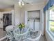 Breakfast nook with glass table, laundry units and view of the kitchen at 485 Schooner St, North Port, FL 34287