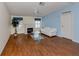 Bright living room with hardwood floors, fireplace, and ample natural light at 485 Schooner St, North Port, FL 34287