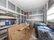 Organized storage area with shelving and containers to maximize space at 485 Schooner St, North Port, FL 34287