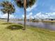 Picturesque water view showcasing the beautiful landscaping surrounding the property, perfect for outdoor enjoyment at 485 Schooner St, North Port, FL 34287