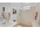 Bright bathroom featuring a walk-in shower, modern fixtures, and a tiled wall at 4912 Bella Terra Dr, Venice, FL 34293