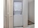Laundry room featuring stacked washer and dryer at 528 W Venice Ave # 1, Venice, FL 34285