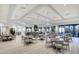 Beautifully decorated dining room with hardwood floors, ample seating and a bar area at 5674 Palmer Circle Dr # 203, Bradenton, FL 34211