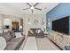 Open-concept living room showcases stylish decor and seamless flow to other areas at 5674 Palmer Circle Dr # 203, Bradenton, FL 34211