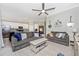 Spacious living room adjacent to the kitchen creates an open and inviting living space at 5674 Palmer Circle Dr # 203, Bradenton, FL 34211