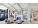 Modern lounge with cozy seating, a fireplace, and stylish decor at 5674 Palmer Circle Dr # 203, Bradenton, FL 34211